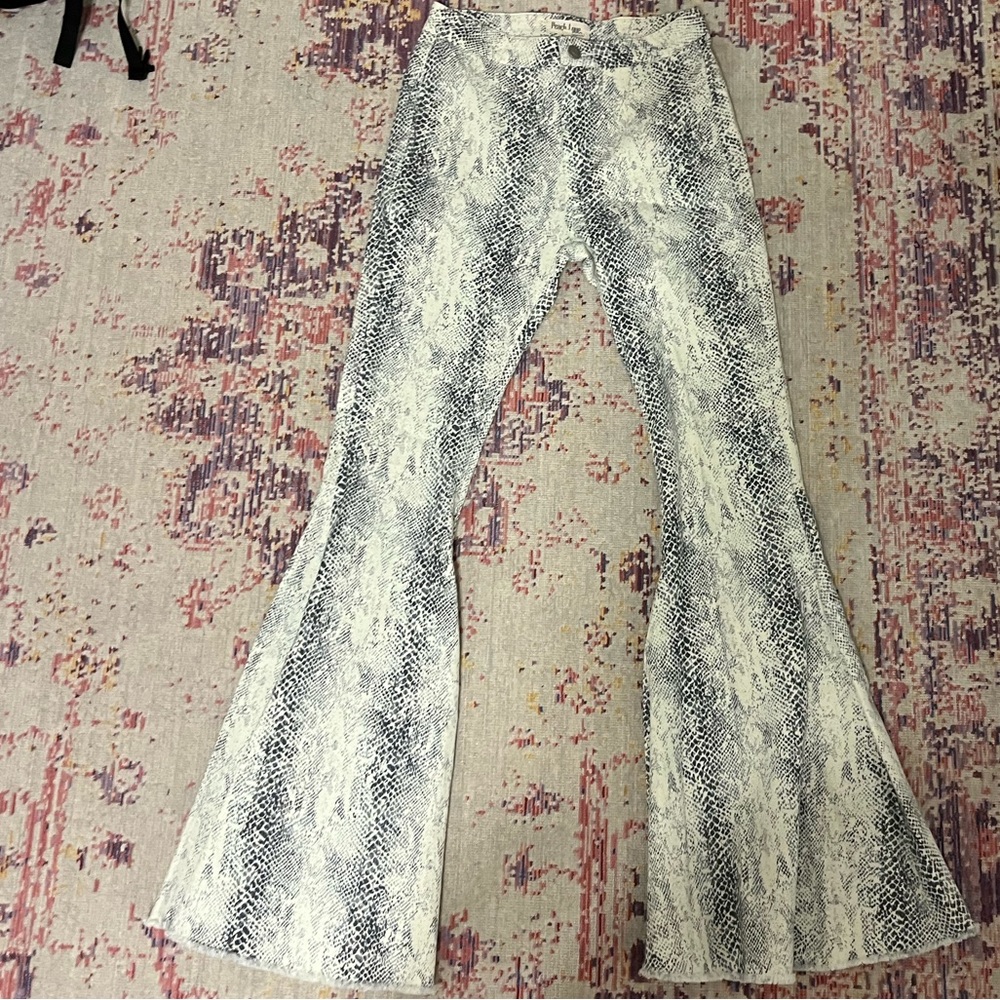 SNAKE PRINT DENIM FLARED PANTS